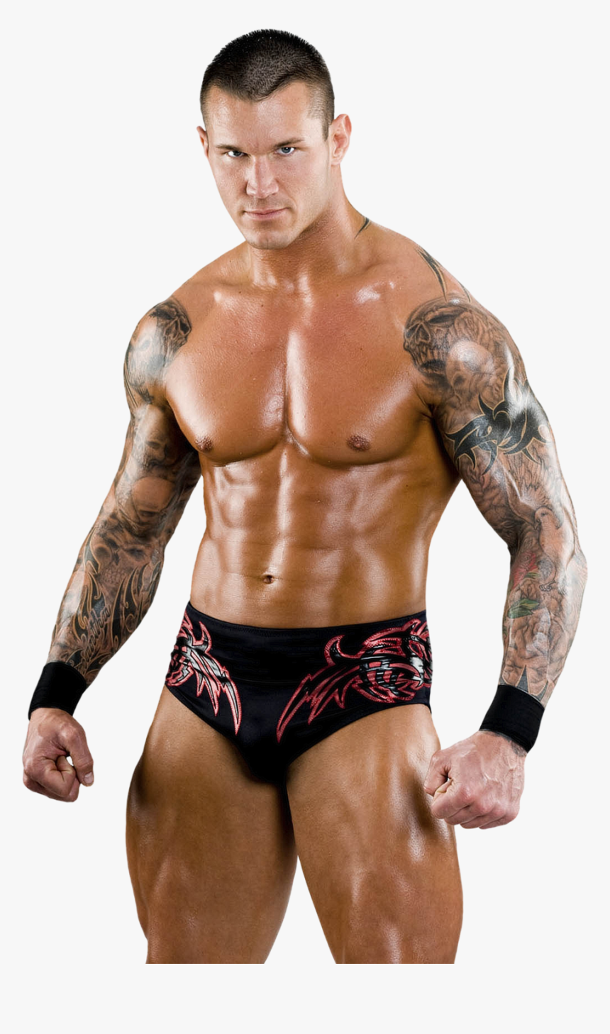 Randy Orton stares down the camera with black trunks on.